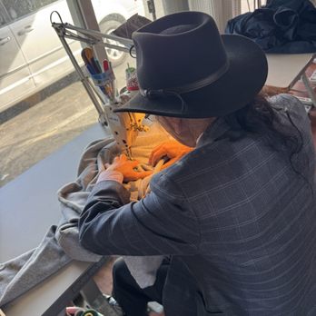 Khanh Alterations - Khahn, the owner immediately getting to work on my sweatshirt. - Sewing & Alterations Near Me - San Diego, California Khanh Alterations - Khahn, the owner immediately getting to work on my sweatshirt. - Sewing & Alterations Near Me - San Diego, California