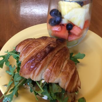 Baguette Magic - Feta, arugula, honey Crossandwich, with a side of fresh fruit salad. - Bakeries Near Me - Charleston, South Carolina