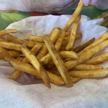 Cheeseburger In Paradise - $7 fries that the menu states is enough to feed your entire table - Burgers Near Me - Honolulu, Hawaii