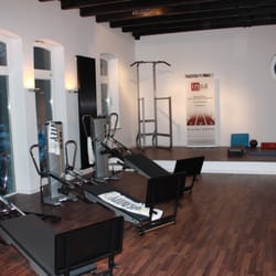 Alster Studio - Der Fitnessraum - mit Multifunktionsgeräten und Bar