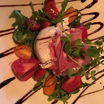 Piazza Bistro - a plate of food with meat and vegetables - Bistros Near Me - Oakville, Ontario