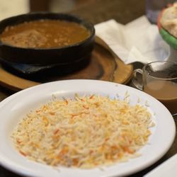 Shibam Yemeni Kitchen - Rice, lamb fahsa in background