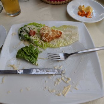 River Café - Caesar Salad. Literally 3 pieces of lettuce with morsels of bacon and some croutons. - Mexican Near Me - Puerto Vallarta, JAL River Café - Caesar Salad. Literally 3 pieces of lettuce with morsels of bacon and some croutons. - Mexican Near Me - Puerto Vallarta, JAL