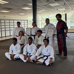 Double Dragon Karate Institute - Sensei's: Back row: Hanshi, Paula, David & Tylor. Middle row: Delia & Arthur. Front Row: Ray, Eylan & Gisella. Total Black Belts number '49'