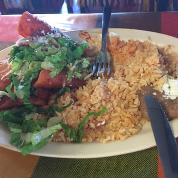 Nancy's Restaurant - The enchiladas were gone by the end, and you can see my dad already ate some of it before I got a picture. He said it was really good! - Mexican Near Me - Oxnard, California