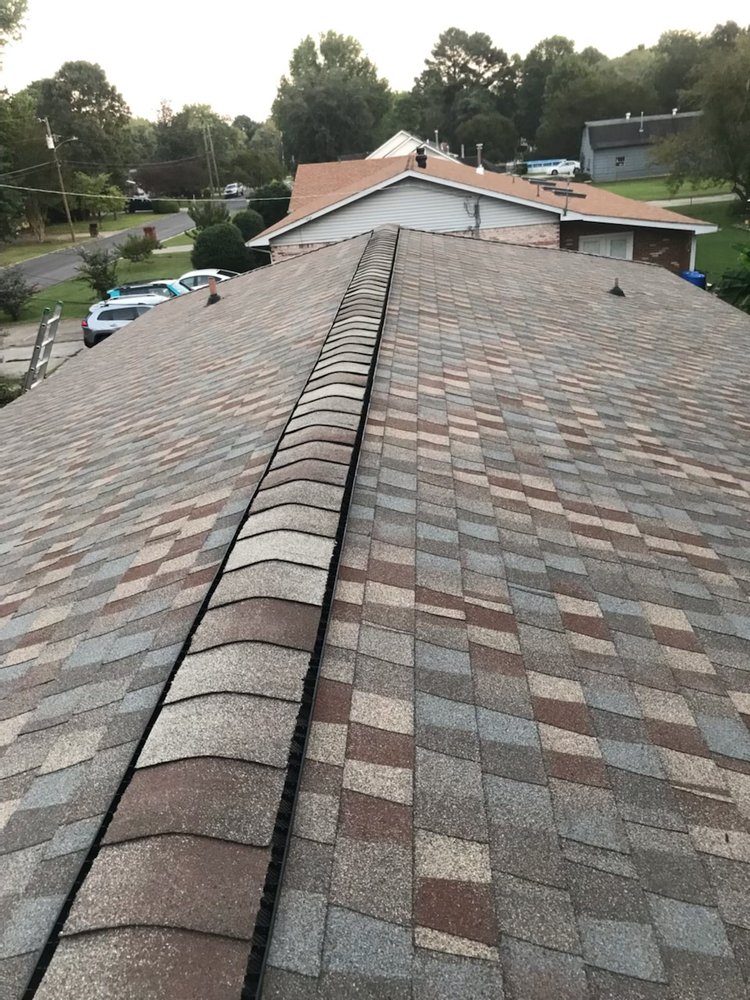 Slide of Arkbow Roofing