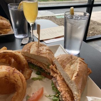 Calafia Kitchen - Blackened salmon sandwich with ridiculously large onion rings. So good! - Breakfast & Brunch Near Me - Livermore, California