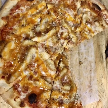 Pugsley's Pizza - Buffalo chicken pizza, delicious! They have their own homemade cured peppers that you can add to the pizza, super spicy but incredible. - Pizza Near Me - Bronx, New York