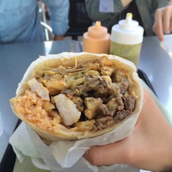 Cali Tacos - Angel burrito for $10.79. California burrito with carne Asada, shrimp, and guacamole! - Mexican Near Me - Orange, California Cali Tacos - Angel burrito for $10.79. California burrito with carne Asada, shrimp, and guacamole! - Mexican Near Me - Orange, California
