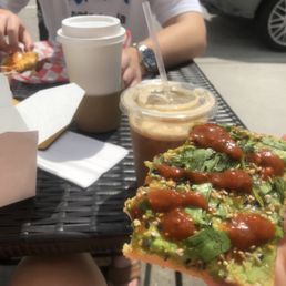 Avocado toast and iced latte Avocado toast and iced latte