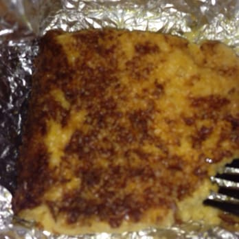 4 Rivers Smokehouse - Square of cheese baked grits, unique and delicious! - Barbeque Near Me - Gainesville, Florida