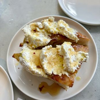 Fossetta - Ricotta Focaccia with Hot Honey - Italian Near Me - New York, New York Fossetta - Ricotta Focaccia with Hot Honey - Italian Near Me - New York, New York