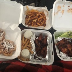 Coop Deville - Bacon cheese fries, bbq wings with celery, honey bbq wings with fries and funnel cakes.