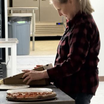 Gladys Pizza - Owner packing pizzas - Pizza Near Me - Fish Haven, Idaho