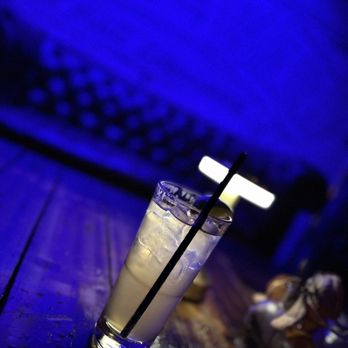Watts & Ward - a glass of alcohol on a wooden table - Speakeasies Near Me - Raleigh, North Carolina Watts & Ward - a glass of alcohol on a wooden table - Speakeasies Near Me - Raleigh, North Carolina