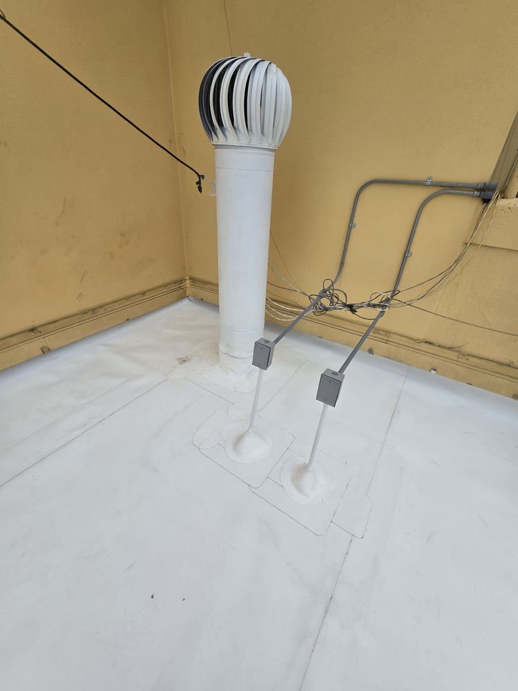 Slide of J&E Roofing Services