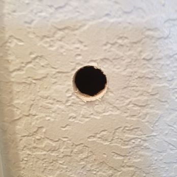 ADT Security Services - After they put this hole in my wall, they wanted almost $300 more than they originally told me. - Security Systems Near Me - Bothell, Washington