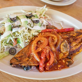 Mambo Seafood - Redfish in tomato garlic sauce - Seafood Near Me - Houston, Texas Mambo Seafood - Redfish in tomato garlic sauce - Seafood Near Me - Houston, Texas