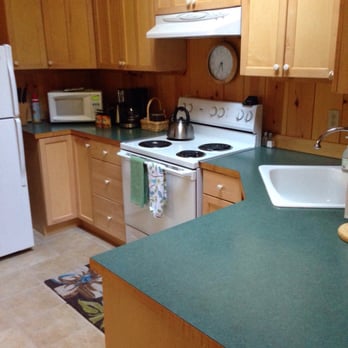 Deep Forest Cabins - Kitchen with pots & pans plus your usual utensils with full size fridge - Guest Houses Near Me - Ashford, Washington
