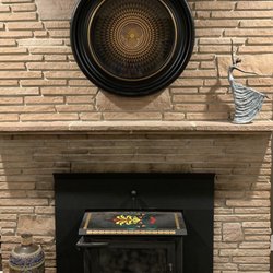 Clever Clocks - Recent addition to our living room. Beautifully made clock on a circular mahogany block