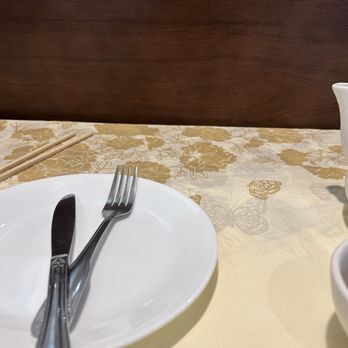 Victoria Seafood Restaurant - Table jammed in next to other table for a single diner on take out table - Chinese Near Me - Boston, Massachusetts