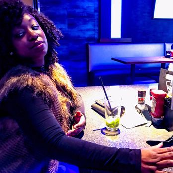 Topgolf - Posing at the bar - New American Near Me - Atlanta, Georgia Topgolf - Posing at the bar - New American Near Me - Atlanta, Georgia