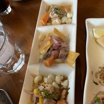 Puerto 27 Peruvian Kitchen & Pisco Bar - $27 Sampler - extremely small portions! About 3 bits of fish each - Peruvian Near Me - Pacifica, California Puerto 27 Peruvian Kitchen & Pisco Bar - $27 Sampler - extremely small portions! About 3 bits of fish each - Peruvian Near Me - Pacifica, California