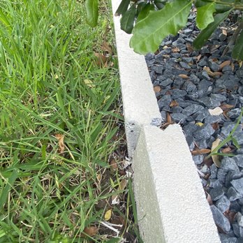 BGE services - Border bowing out. Rocks will soon be be spilling over - Landscaping Near Me