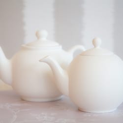 Pottery Corner - Unglazed T pots awaiting design flair