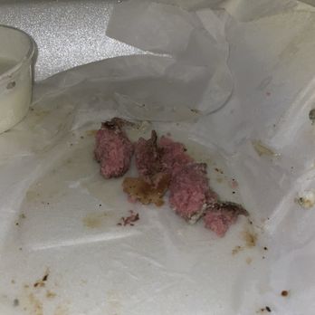 Brookhaven Pub & Grill - Pieces of the burger he had to spit out because he said "something doesn't taste right AT ALL!!" - Pubs Near Me - Memphis, Tennessee