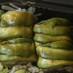 Eel sauce is not on the top, the avocado is just brown. Eel sauce is not on the top, the avocado is just brown.