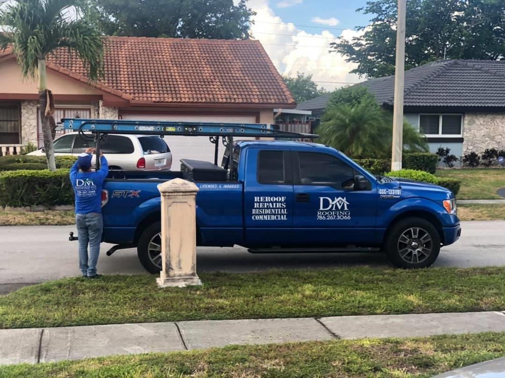 Slide of DM Roofing Company