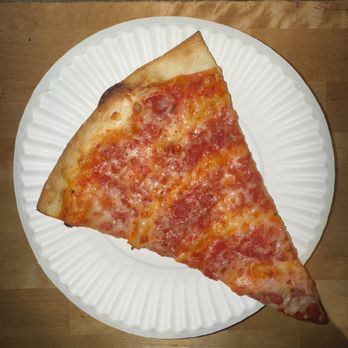 Champion Pizza - Chamion Pizza pretty good, cheap Cheese Slice - Pizza Near Me - New York, New York
