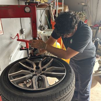 Morales Tire & Auto Electric - Technician Kevin going straight to work on my tire. - Auto Repair Near Me - Yucaipa, California Morales Tire & Auto Electric - Technician Kevin going straight to work on my tire. - Auto Repair Near Me - Yucaipa, California