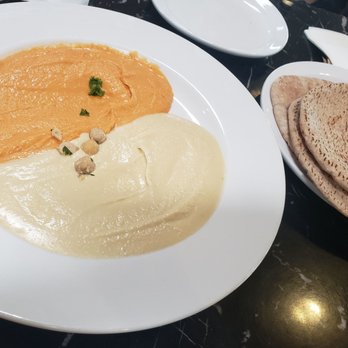 Pita Jungle - Split Roasted Red Pepper and Original Hummus with wheat pitas - Mediterranean Near Me - Phoenix, Arizona Pita Jungle - Split Roasted Red Pepper and Original Hummus with wheat pitas - Mediterranean Near Me - Phoenix, Arizona