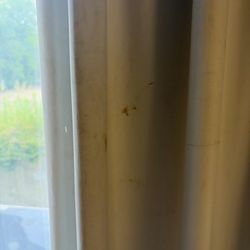 Holiday Inn Express & Suites Natchez South - A stained curtain. Extremely noticeable.