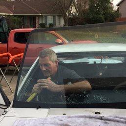 Scott removing the old windshield! It's amazing to watch the process of how it's done!!