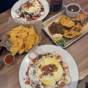 Birrieria Coalcoman - Top chilaquiles red birria de borrego (lamb) Middle chips and salsa, birria sampler beef (res) Bottom chilaquiles red with birria de res - Mexican Near Me - Gilroy, California Birrieria Coalcoman - Top chilaquiles red birria de borrego (lamb) Middle chips and salsa, birria sampler beef (res) Bottom chilaquiles red with birria de res - Mexican Near Me - Gilroy, California
