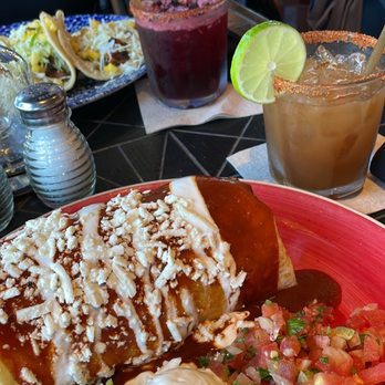 Asada Cantina + Kitchen - Spicy Dark Ranchero Burrito with Al Pastor accompanied by a Tamarind Margarita. - Tacos Near Me - San Clemente, California
