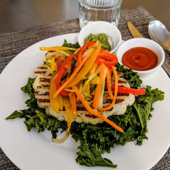 Sun Belly Cafe - Cauliflower steak with tomato Sriracha sauce - Vegetarian Near Me - Greenville, South Carolina Sun Belly Cafe - Cauliflower steak with tomato Sriracha sauce - Vegetarian Near Me - Greenville, South Carolina
