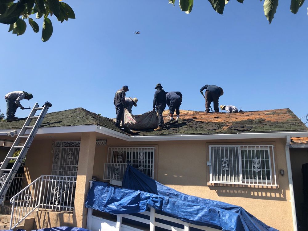 Slide of Pacific Roofing