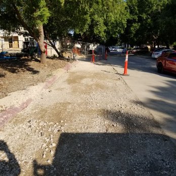 Optomuz Construction Services - Graded this entrance and drive for these residence. Excavated old asphalt and cut out 3" of base so we can lay 2 1/2 " of type 2 Asphalt - Masonry/Concrete Near Me - Helotes, Texas