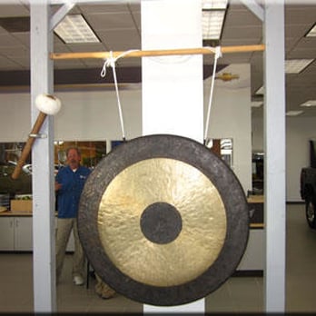 Harvard Chevrolet Buick GMC - Customer's who purchase cars with us, "Bang the Gong!" as a symbol of good luck! The team congratulates the customer with a... - Car Dealers Near Me - Harvard, Illinois Harvard Chevrolet Buick GMC - Customer's who purchase cars with us, "Bang the Gong!" as a symbol of good luck! The team congratulates the customer with a... - Car Dealers Near Me - Harvard, Illinois