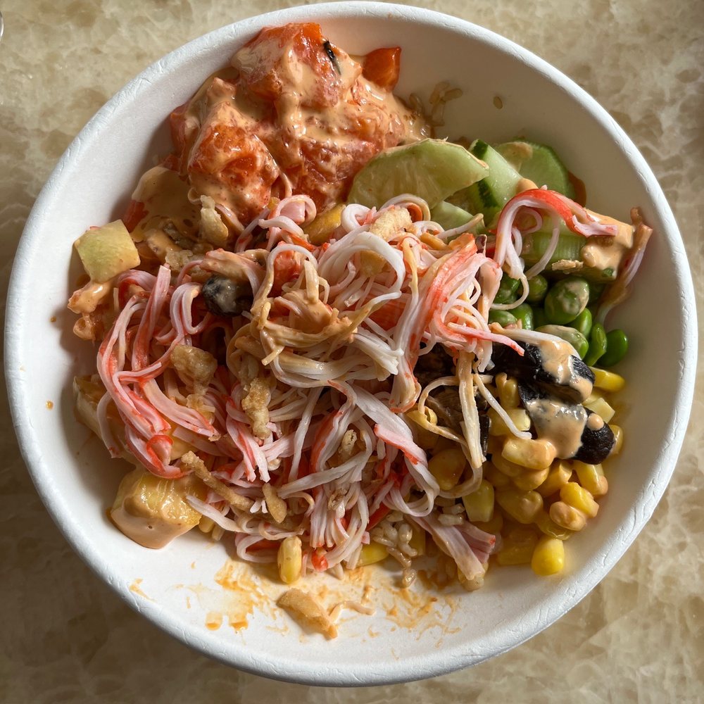 Custom bowl: 2 proteins and a lot of toppings! Love the poke special sauce