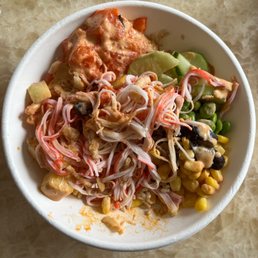 Custom bowl: 2 proteins and a lot of toppings! Love the poke special sauce Custom bowl: 2 proteins and a lot of toppings! Love the poke special sauce