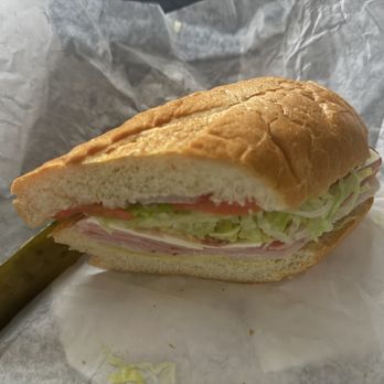 Deli Mart - Half of a Torpedo (cold cut) sandwich on a soft roll. - Convenience Stores Near Me - San Diego, California