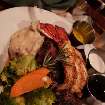 Buzz's - Surf and turf - riveted cooked medium rare, garlic mash and a lobster tail. Escargot in the background! - Steakhouses Near Me - Kailua, Hawaii Buzz's - Surf and turf - riveted cooked medium rare, garlic mash and a lobster tail. Escargot in the background! - Steakhouses Near Me - Kailua, Hawaii
