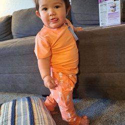 Little Bipsy - She's 10 months and fits 2-3T pants and shirt.