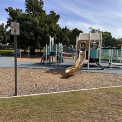 City Hall Park - To the right is the older kid side, swings in the middle and the toddler area to the left