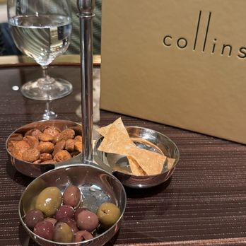 Collins - Complimentary snacks (seasoned nuts, bow tie crackers, and olives). - Cocktail Bars Near Me - Las Vegas, Nevada